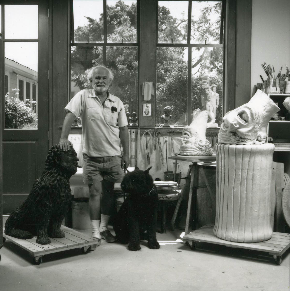 Arneson with his dog, Zeus, at 430 First Street studio in Benicia, CA, 1986.