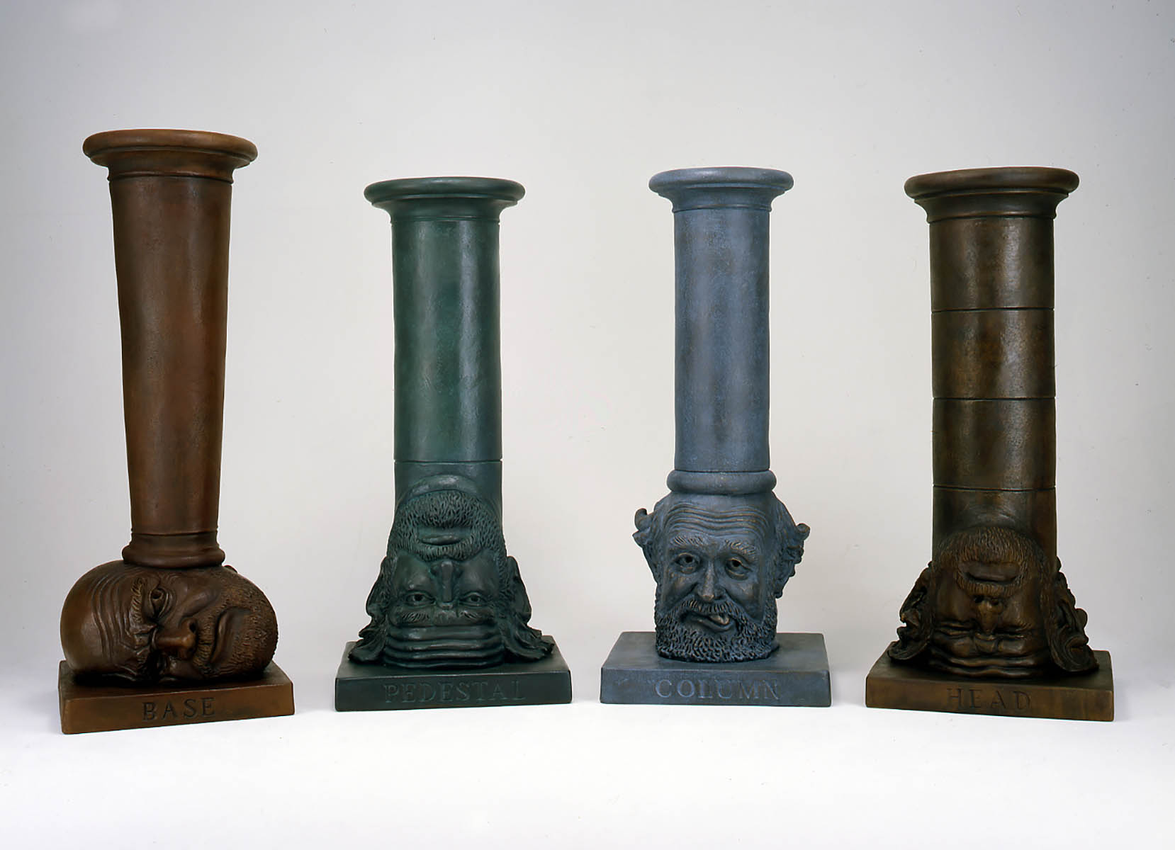 Robert Arneson, Head Stand for Naught, 1992/2000; Base for Easy Listening, 1992/2000; Pedestal for Self Evaluation, 1992/2000; Column for a Toupee, 1992/2000.